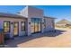 Exterior view of the modern home featuring a neutral color palette and clean lines at 23656 N 123Rd St # 240, Scottsdale, AZ 85255
