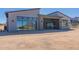 Exterior view of the back of the house with the covered patio at 23656 N 123Rd St # 240, Scottsdale, AZ 85255