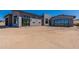 Contemporary home featuring a neutral exterior and expansive windows showcasing the desert landscape at 23656 N 123Rd St # 240, Scottsdale, AZ 85255
