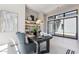 Stylish office featuring a dark wood desk and a built-in display cabinet at 23656 N 123Rd St # 240, Scottsdale, AZ 85255