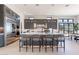 Stylish kitchen with an island with seating, modern cabinets, and mountain views at 23656 N 123Rd St # 240, Scottsdale, AZ 85255