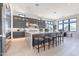 Spacious kitchen with a large center island, sleek cabinetry, and modern appliances at 23656 N 123Rd St # 240, Scottsdale, AZ 85255