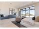 Bright bedroom with dresser, full-length mirrors and scenic views from oversized window at 23656 N 123Rd St # 240, Scottsdale, AZ 85255