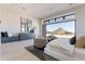 Bright bedroom with dresser, full-length mirrors and scenic views from oversized window at 23656 N 123Rd St # 240, Scottsdale, AZ 85255