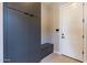 Functional mudroom features bench, storage, and a sleek design near the entryway at 23656 N 123Rd St # 240, Scottsdale, AZ 85255