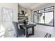 Stylish office featuring an outdoor patio view, built in shelving, and modern decor at 23656 N 123Rd St # 240, Scottsdale, AZ 85255
