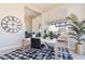 View of the office desk with views through archway of bedroom and living room at 23656 N 123Rd St # 240, Scottsdale, AZ 85255