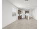 Spacious kitchen featuring stainless steel appliances and center island at 23972 W Cocopah St, Buckeye, AZ 85326