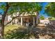 Backyard featuring a covered patio, lush lawn and lots of room for activities at 26066 N 72Nd Ave, Peoria, AZ 85383