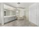 Relaxing Primary bath with dual sinks, a soaking tub, and a glass enclosed shower at 26066 N 72Nd Ave, Peoria, AZ 85383