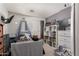 Cozy bedroom featuring a comfortable bed, storage unit, and playful decor at 26066 N 72Nd Ave, Peoria, AZ 85383