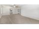 Generously sized main bedroom with neutral carpeting and access to the ensuite at 26066 N 72Nd Ave, Peoria, AZ 85383