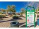Well-maintained park with clear signage outlining rules and regulations for visitors at 26066 N 72Nd Ave, Peoria, AZ 85383