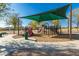 Community playground with shade, slides, and climbing structures for outdoor fun at 26066 N 72Nd Ave, Peoria, AZ 85383