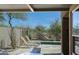 Outdoor patio area featuring a lounge seating and a pool surrounded by desert landscape at 32835 N 70Th St, Scottsdale, AZ 85266