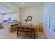 The dining room has an open view of the beautifully designed kitchen at 32835 N 70Th St, Scottsdale, AZ 85266