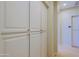 Hallway area featuring tall white storage cabinets at 32835 N 70Th St, Scottsdale, AZ 85266