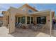 Covered patio with ample seating, perfect for outdoor dining and entertaining at 32835 N 70Th St, Scottsdale, AZ 85266