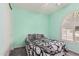 Bedroom featuring shutters, closet, and an interesting pattern on the comforter at 3943 E Ficus Way, Gilbert, AZ 85298