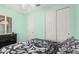 Bedroom featuring shutters, a closet, and neutral walls at 3943 E Ficus Way, Gilbert, AZ 85298
