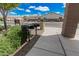 Community park offers convenient grilling stations, lush greenery, and well-maintained sidewalks for outdoor cooking and socializing at 3943 E Ficus Way, Gilbert, AZ 85298