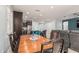 Open-concept dining room with views to the kitchen and living room providing ample natural light at 3943 E Ficus Way, Gilbert, AZ 85298