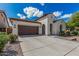 Inviting single-Gathering home with a two-car garage and easy care landscaping at 3943 E Ficus Way, Gilbert, AZ 85298