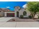 Charming single-story home with stucco exterior, tile roof, and low-maintenance desert landscaping at 3943 E Ficus Way, Gilbert, AZ 85298