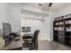 Spacious home office has a desk, and built-in bookshelves at 3943 E Ficus Way, Gilbert, AZ 85298