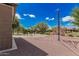 Community playground with climbing structure, swing set, and a safe, cushioned ground cover, ideal for active children at 3943 E Ficus Way, Gilbert, AZ 85298