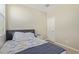 Tastefully decorated bedroom featuring a comfortable bed with quality linens, offering a relaxing retreat for rest and rejuvenation at 40835 W Agave Rd, Maricopa, AZ 85138