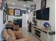 Unique entertainment room, personalized with sports memorabilia, and comfortable seating at 4306 W Summerside Rd, Laveen, AZ 85339