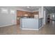 Bright kitchen with stainless steel appliances, tile backsplash, and tiled floor at 4306 W Summerside Rd, Laveen, AZ 85339