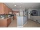 Bright kitchen with stainless steel appliances, tiled backsplash, and ample counter space at 4306 W Summerside Rd, Laveen, AZ 85339