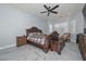 Spacious main bedroom features a ceiling fan, decorative furniture, and plantation shutters at 4306 W Summerside Rd, Laveen, AZ 85339