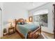 Cozy bedroom featuring a wooden bed frame, two bedside lamps, and a window at 4722 E Casey Ln, Cave Creek, AZ 85331