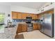 Updated kitchen boasts stainless steel appliances, granite countertops, and ample cabinet space at 4722 E Casey Ln, Cave Creek, AZ 85331