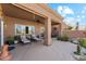 Outdoor patio with seating area, plants, ceiling fan, and beige flooring at 4722 E Casey Ln, Cave Creek, AZ 85331