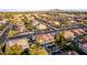 An aerial view of a suburban community featuring lush landscaping and mature trees at 4812 S Windstream Pl, Chandler, AZ 85249