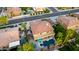 Overhead aerial shot of a neighborhood showcasing well-spaced homes, verdant landscaping, and orderly street patterns at 4812 S Windstream Pl, Chandler, AZ 85249