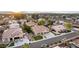 An aerial view of a suburban community featuring lush landscaping and mature trees at 4812 S Windstream Pl, Chandler, AZ 85249