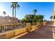 Spacious balcony overlooking palm trees and neighboring homes, perfect for relaxation at 4812 S Windstream Pl, Chandler, AZ 85249