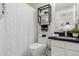 Well-lit bathroom with a shower, stylish shelving, and modern fixtures and a sink at 4812 S Windstream Pl, Chandler, AZ 85249