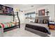 Cozy bedroom featuring a bunk bed, full bed, and neutral tones at 4812 S Windstream Pl, Chandler, AZ 85249