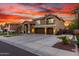 Stunning two-story home boasting a three-car garage and beautifully landscaped front yard at 4812 S Windstream Pl, Chandler, AZ 85249