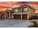 Charming two-story home featuring a spacious three-car garage, and manicured landscaping at 4812 S Windstream Pl, Chandler, AZ 85249