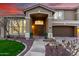 Inviting front entrance showcasing a well-manicured garden and double-door entry at 4812 S Windstream Pl, Chandler, AZ 85249