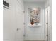 Hallway featuring artwork in a niche, adding character to this inviting space at 4812 S Windstream Pl, Chandler, AZ 85249