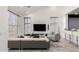 Stylish living room featuring high ceilings, large windows, and modern furniture at 4812 S Windstream Pl, Chandler, AZ 85249