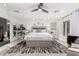 Main bedroom featuring a king bed, stylish decor, and bright natural light at 4812 S Windstream Pl, Chandler, AZ 85249